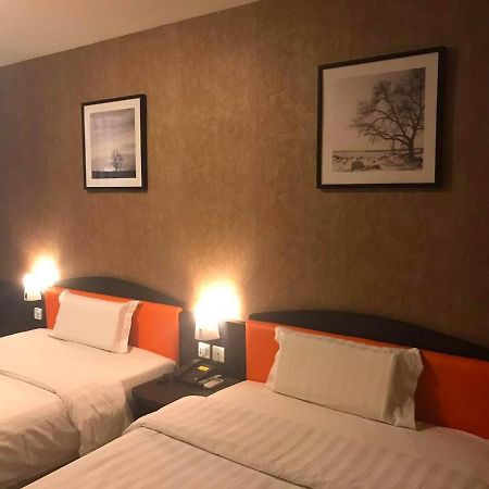 7Days Inn West Liaoyang Road Carrefour Qingdao Esterno foto
