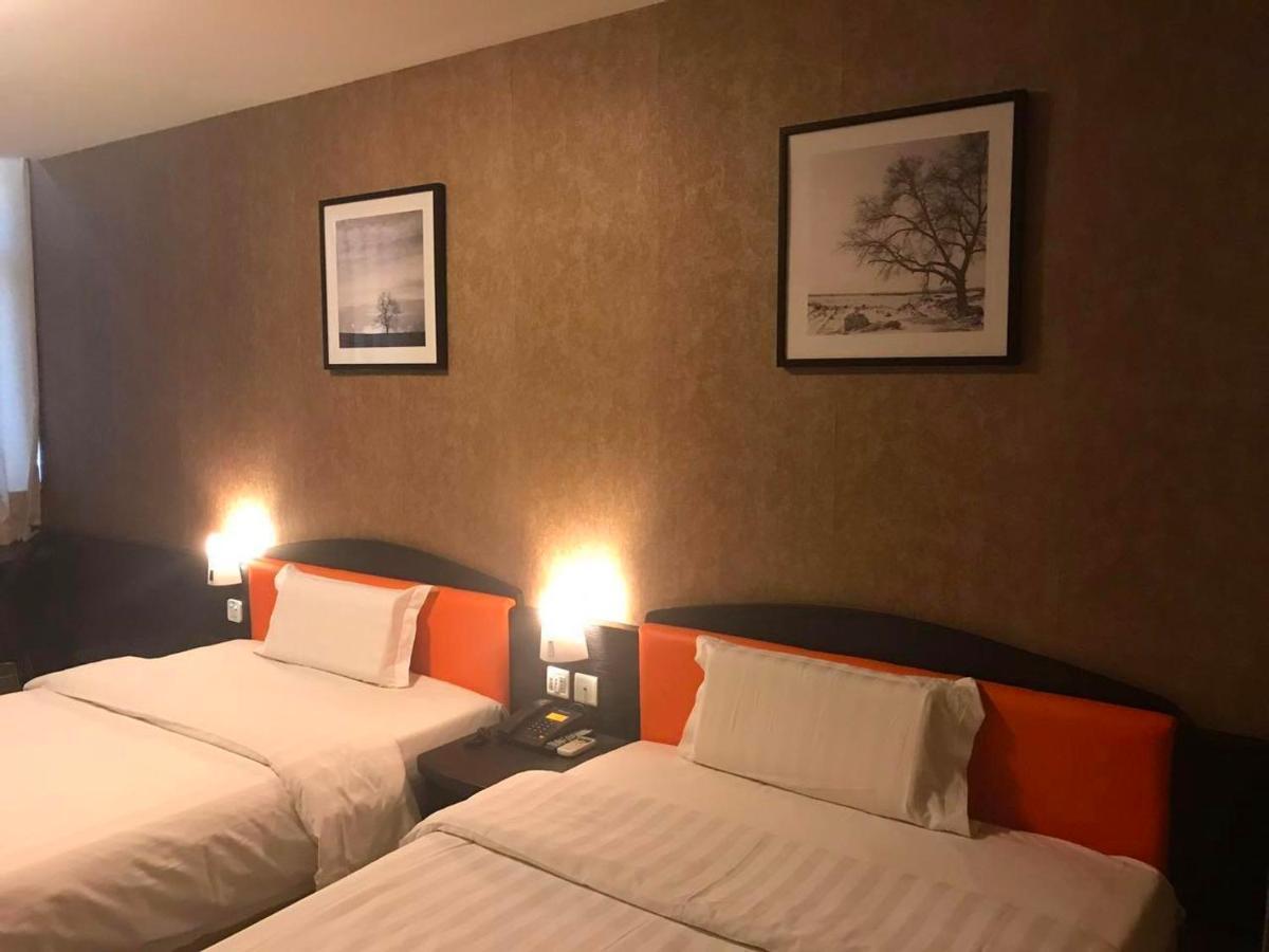 7Days Inn West Liaoyang Road Carrefour Qingdao Esterno foto